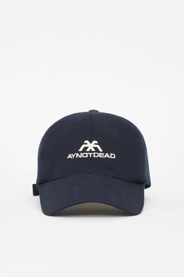 AY NOT DEAD CAP LOGO