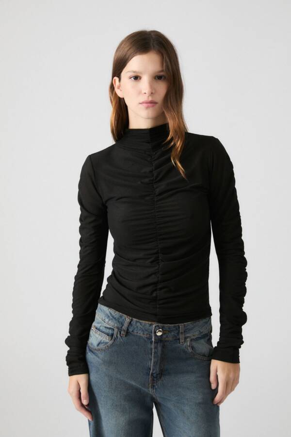 DELUCCA POLERA ALCÁN