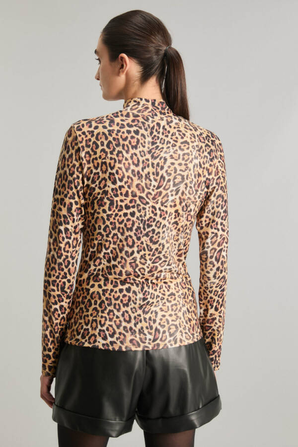 KOSIUKO POLERA GLOW LEOPARD - Image 2