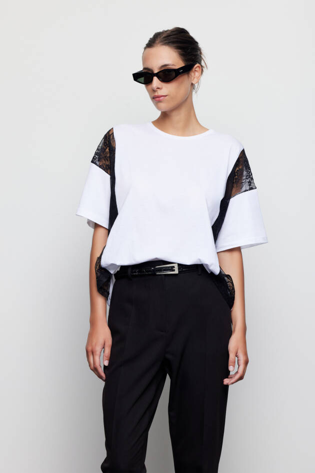 TUCCI REMERA CARO