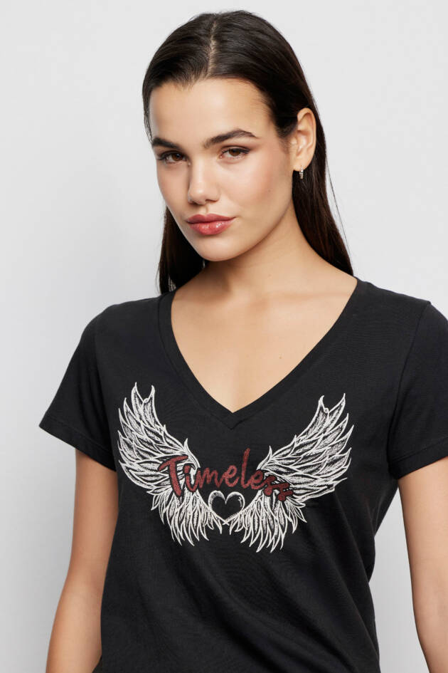 TUCCI REMERA WINGS