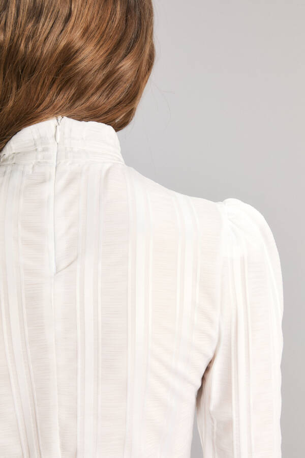 KOSIUKO POLERA RELOADED - Image 2